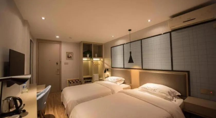 Bed in Borrman Hotel Hefei Guogou Plaza Sanli'an Metro Station