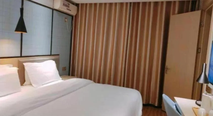 Bed in Borrman Hotel Hefei Guogou Plaza Sanli'an Metro Station