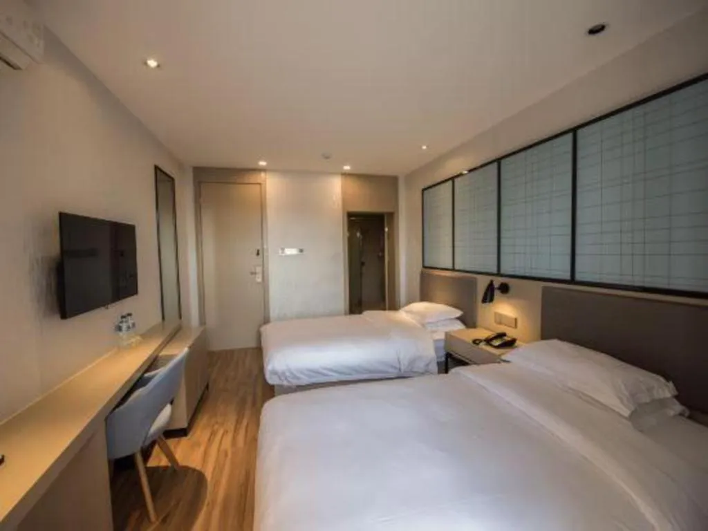 Bed in Borrman Hotel Hefei Guogou Plaza Sanli'an Metro Station