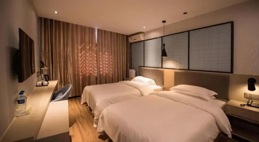 Bed in Borrman Hotel Hefei Guogou Plaza Sanli'an Metro Station Bed in Borrman Hotel Hefei Guogou Plaza Sanli'an Metro Station