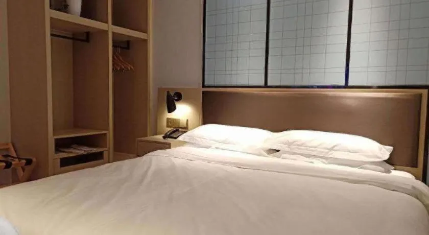 Bed in Borrman Hotel Hefei Guogou Plaza Sanli'an Metro Station