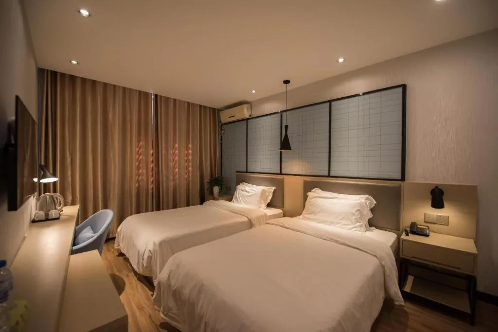 Bed in Borrman Hotel Hefei Guogou Plaza Sanli'an Metro Station