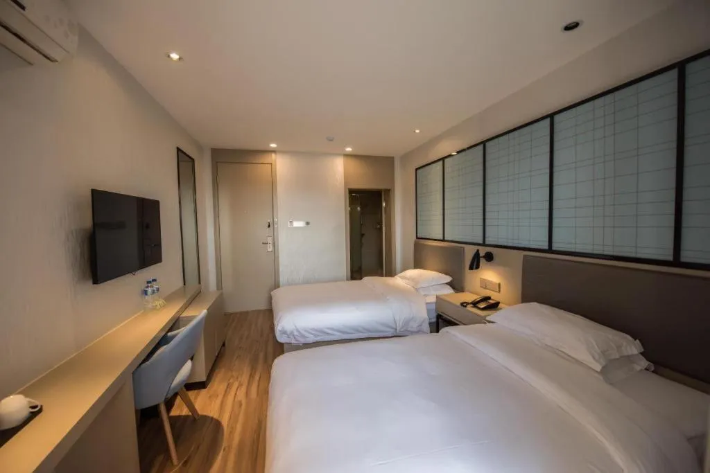 Bed in Borrman Hotel Hefei Guogou Plaza Sanli'an Metro Station