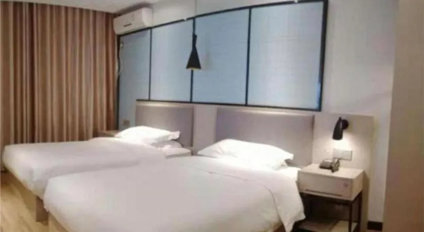 Bed in Borrman Hotel Hefei Guogou Plaza Sanli'an Metro Station