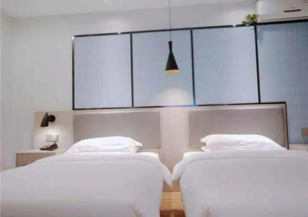 Bed in Borrman Hotel Hefei Guogou Plaza Sanli'an Metro Station