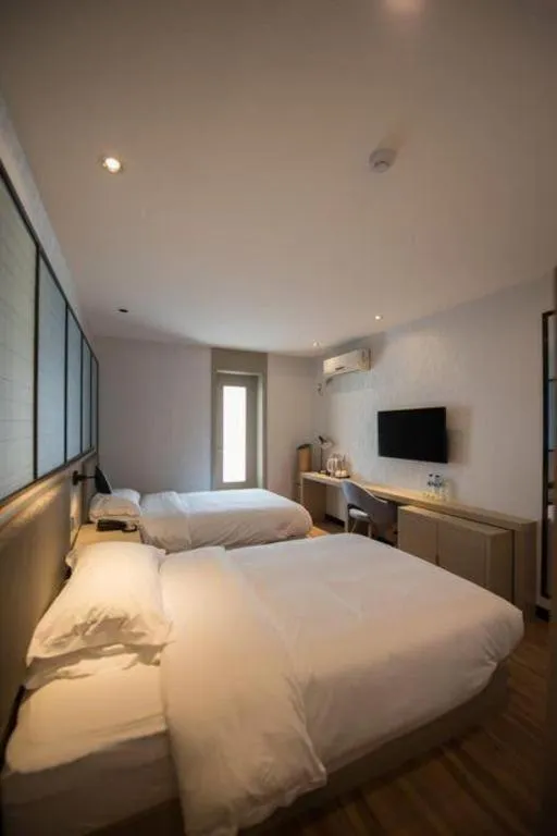 Bed in Borrman Hotel Hefei Guogou Plaza Sanli'an Metro Station