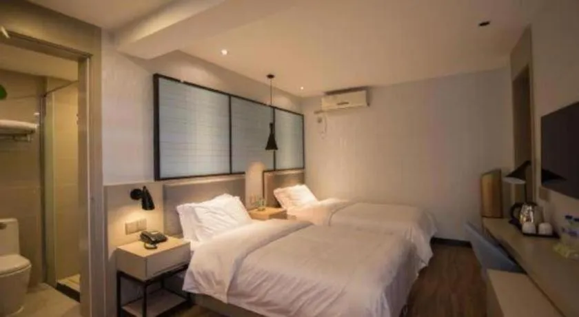 Bed in Borrman Hotel Hefei Guogou Plaza Sanli'an Metro Station