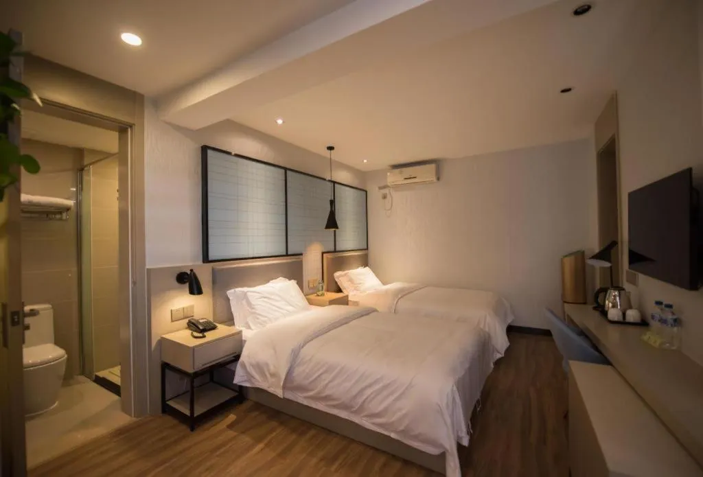 Bed in Borrman Hotel Hefei Guogou Plaza Sanli'an Metro Station