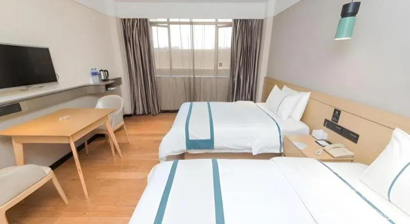 Bed in City Comfort Inn Guangzhou Panyu Qiaonan Aoyuan Plaza