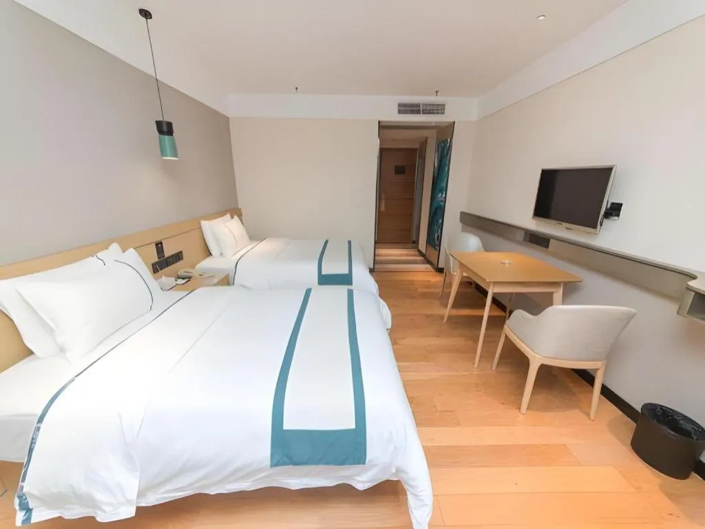 Bed in City Comfort Inn Guangzhou Panyu Qiaonan Aoyuan Plaza