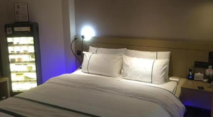 Bed in City Comfort Inn Guangzhou Panyu Qiaonan Aoyuan Plaza