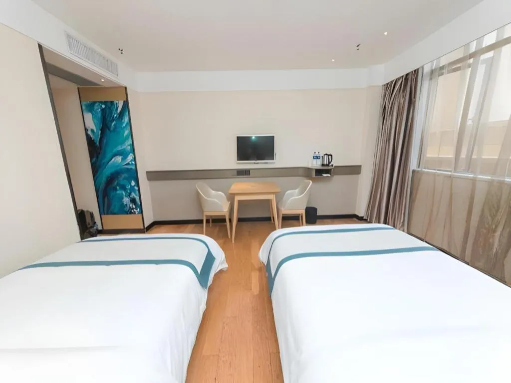 Bed in City Comfort Inn Guangzhou Panyu Qiaonan Aoyuan Plaza