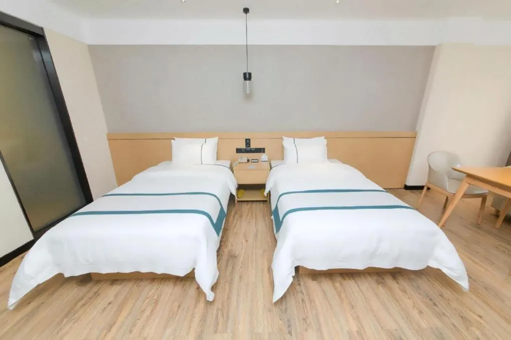 Bed in City Comfort Inn Guangzhou Panyu Qiaonan Aoyuan Plaza