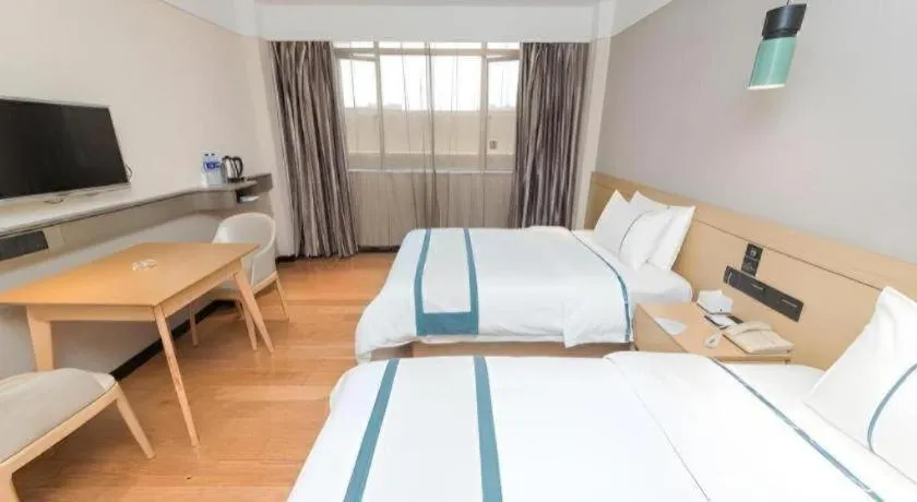 Bed in City Comfort Inn Guangzhou Panyu Qiaonan Aoyuan Plaza