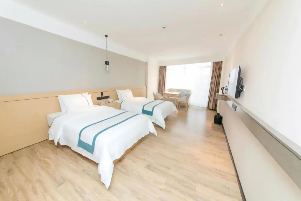 Bed in City Comfort Inn Guangzhou Panyu Qiaonan Aoyuan Plaza