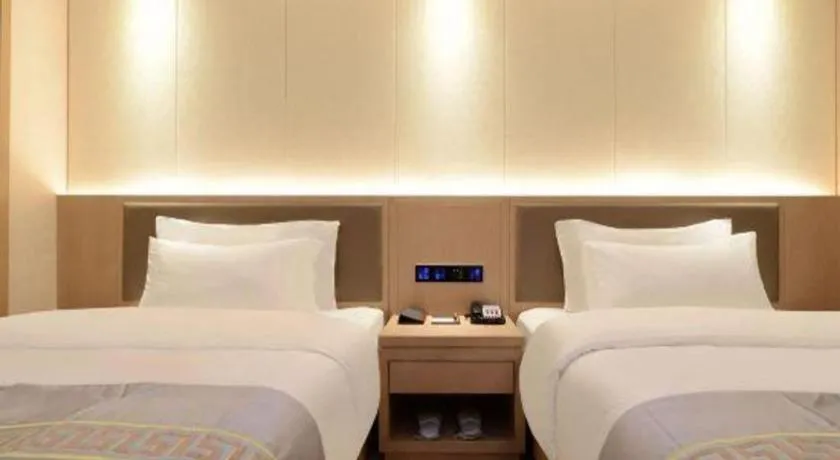 Bed in Borrman Hotel Guiyang Guanshanhu International Conference Center Metro Station