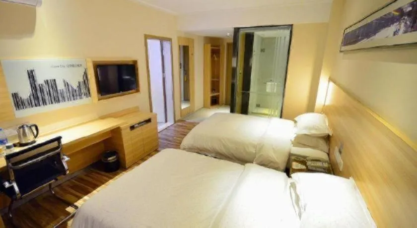 Bed in City Comfort Inn Wuhan Jiangxia Stadium