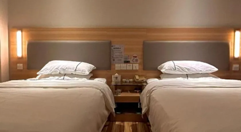 Bed in City Comfort Inn Wuhan Jiangxia Stadium