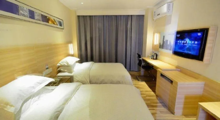 Bed in City Comfort Inn Wuhan Jiangxia Stadium