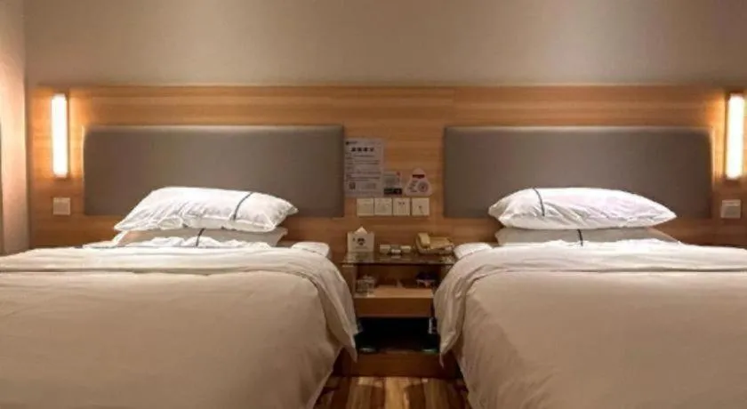 Bed in City Comfort Inn Wuhan Jiangxia Stadium