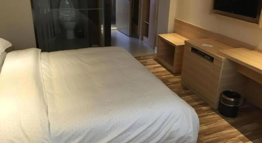 Bed in City Comfort Inn Wuhan Jiangxia Stadium