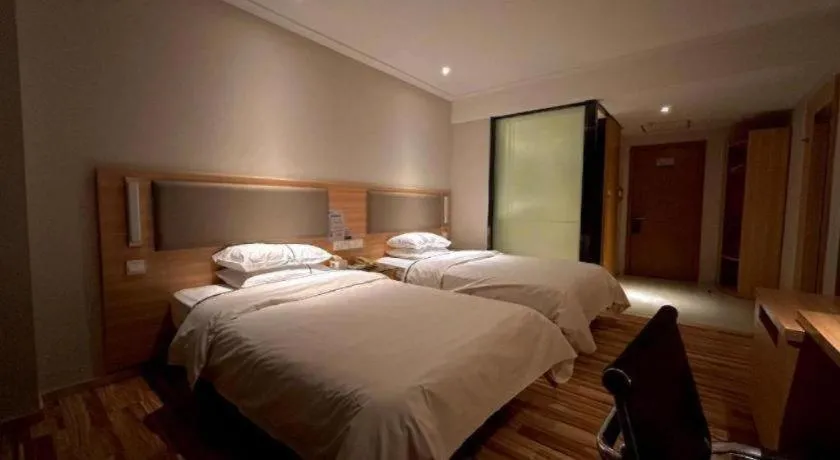 Bed in City Comfort Inn Wuhan Jiangxia Stadium