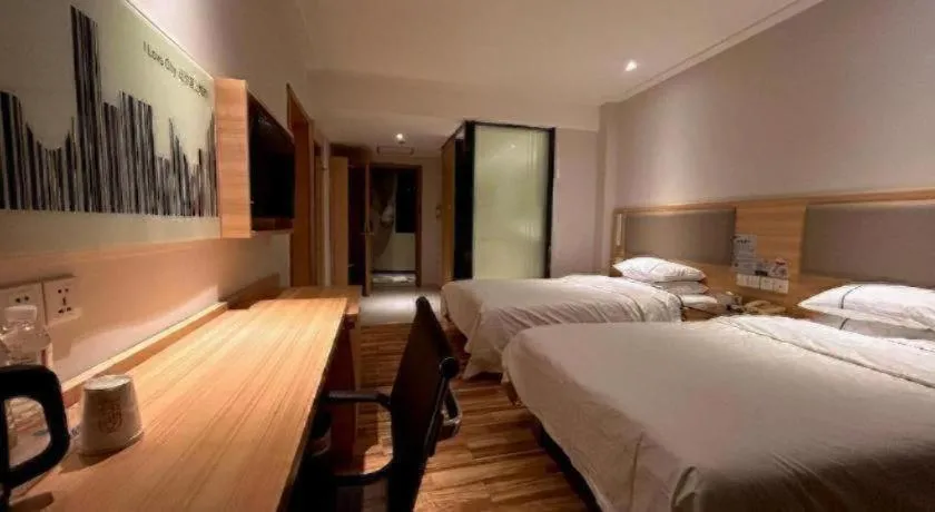 Bed in City Comfort Inn Wuhan Jiangxia Stadium