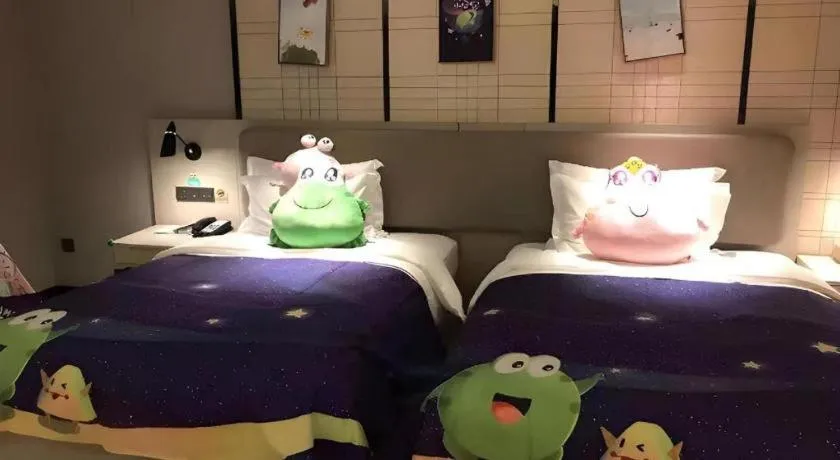 Bed in Echarm Hotel Aegean Shopping Park Zhonghuan Plaza