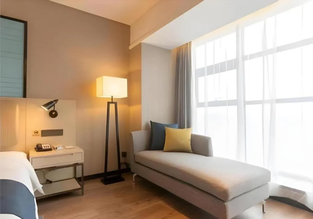 Bed in Echarm Hotel Aegean Shopping Park Zhonghuan Plaza