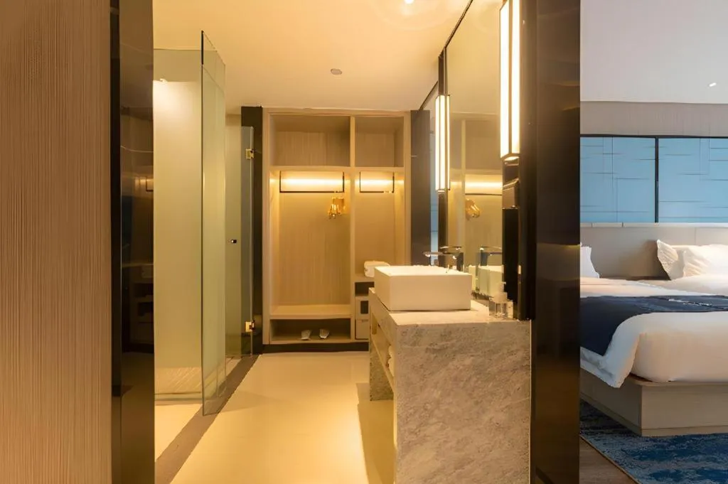 Bed in Echarm Hotel Aegean Shopping Park Zhonghuan Plaza