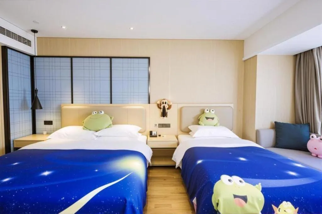 Bed in Echarm Hotel Aegean Shopping Park Zhonghuan Plaza