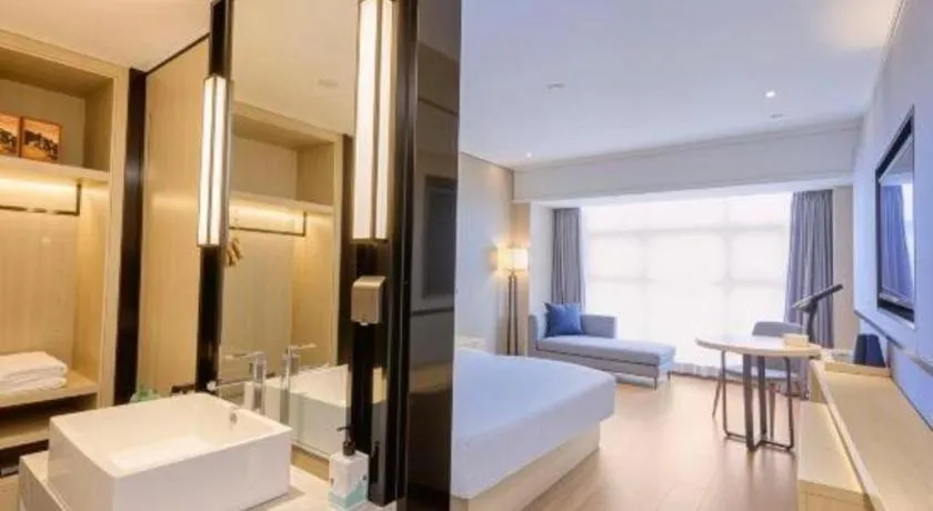 Bed in Echarm Hotel Aegean Shopping Park Zhonghuan Plaza