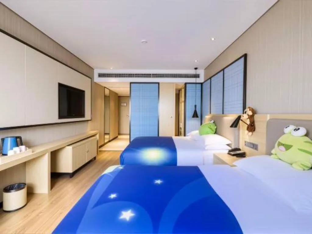 Bed in Echarm Hotel Aegean Shopping Park Zhonghuan Plaza