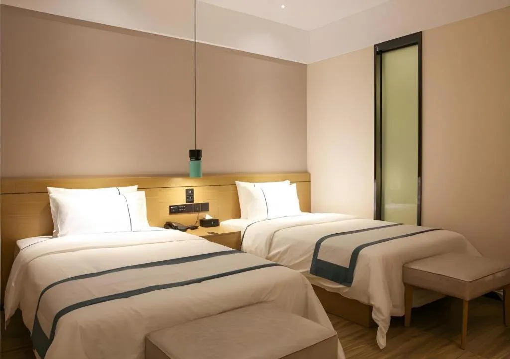 Bed in City Comfort Inn Wuhan Ikea