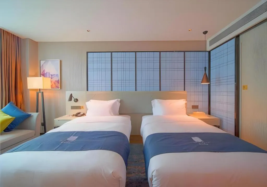 Bed in Echarm Hotel Guangzhou Changlong Shiqiao Metro Station