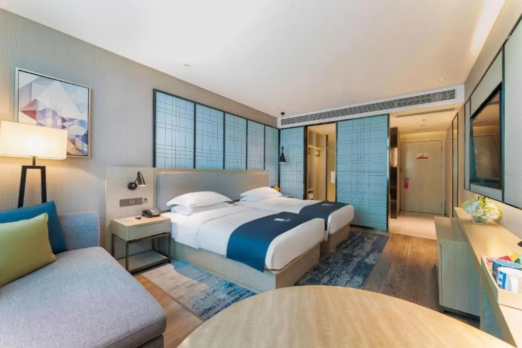 Bed in Echarm Hotel Guangzhou Changlong Shiqiao Metro Station