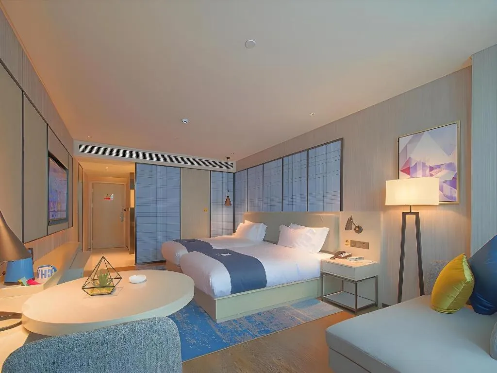 Bed in Echarm Hotel Guangzhou Changlong Shiqiao Metro Station