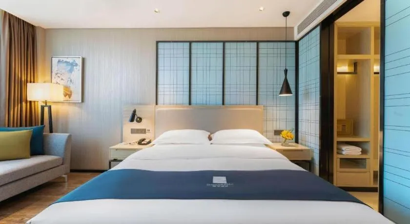 Bed in Echarm Hotel Guangzhou Changlong Shiqiao Metro Station