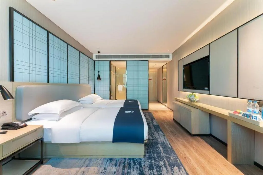 Bed in Echarm Hotel Guangzhou Changlong Shiqiao Metro Station