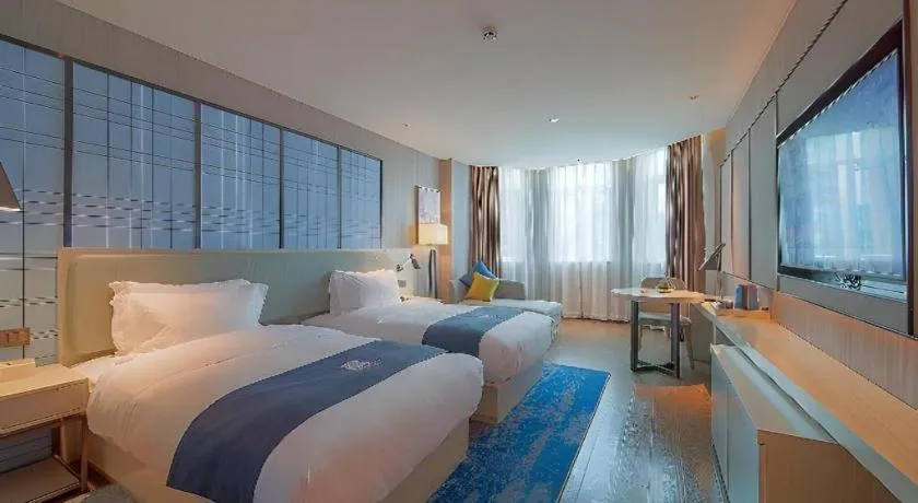 Bed in Echarm Hotel Guangzhou Changlong Shiqiao Metro Station