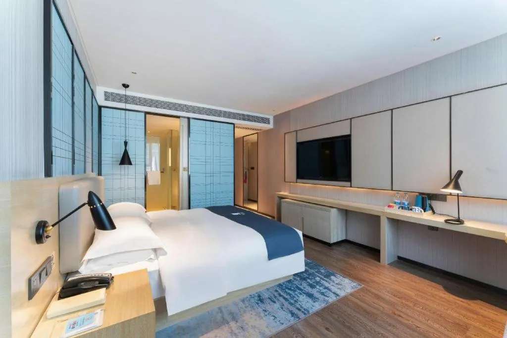 Bed in Echarm Hotel Guangzhou Changlong Shiqiao Metro Station