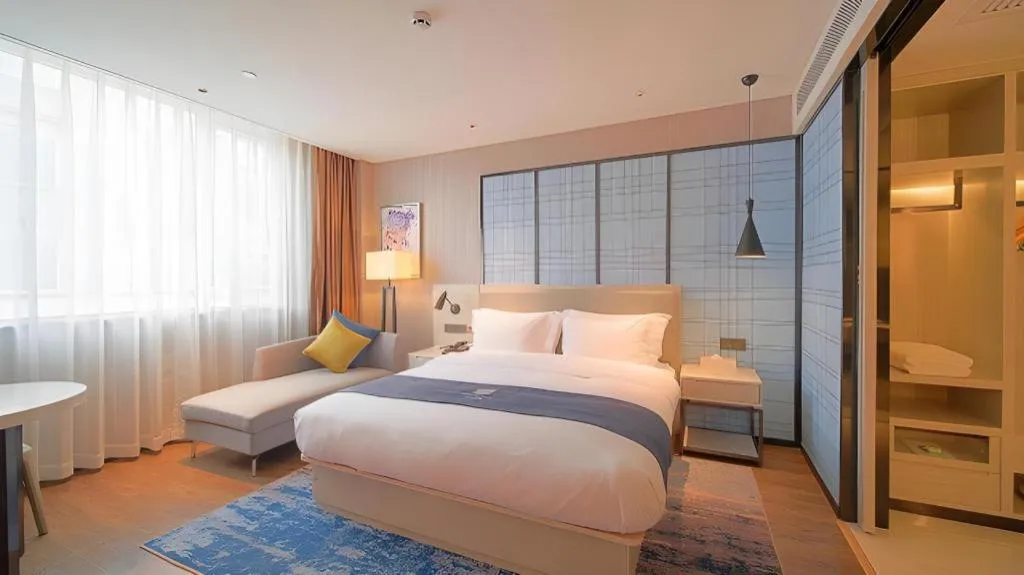 Bed in Echarm Hotel Guangzhou Changlong Shiqiao Metro Station