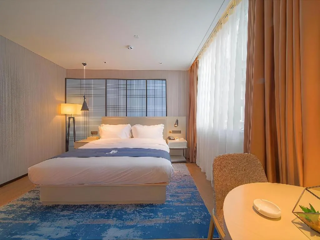 Bed in Echarm Hotel Guangzhou Changlong Shiqiao Metro Station