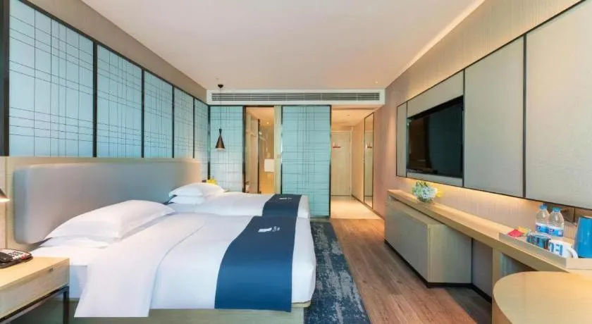 Bed in Echarm Hotel Guangzhou Changlong Shiqiao Metro Station