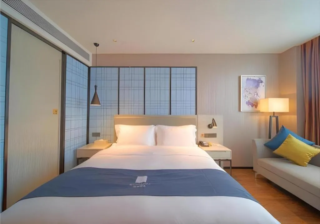 Bed in Echarm Hotel Guangzhou Changlong Shiqiao Metro Station