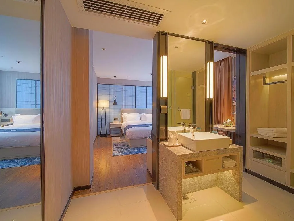 Bed in Echarm Hotel Guangzhou Changlong Shiqiao Metro Station