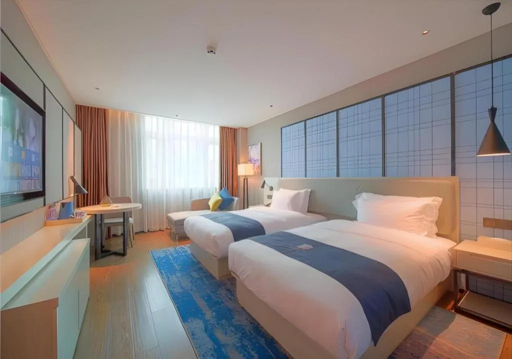 Bed in Echarm Hotel Guangzhou Changlong Shiqiao Metro Station