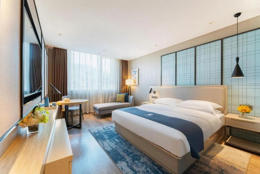 Bed in Echarm Hotel Guangzhou Changlong Shiqiao Metro Station