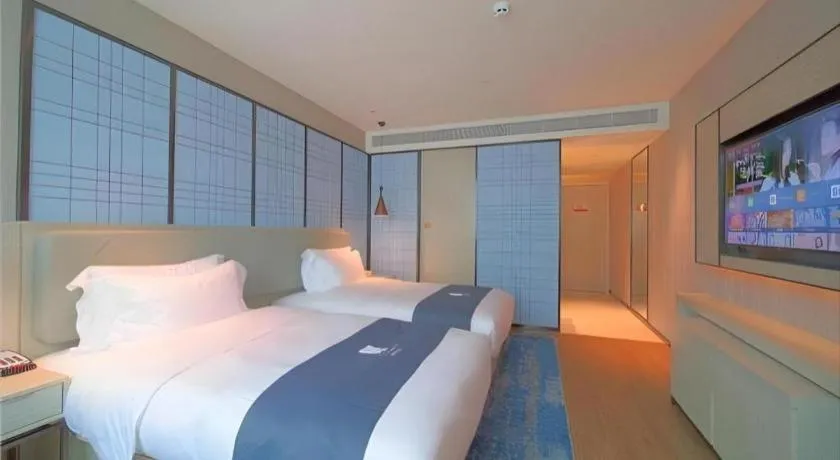 Bed in Echarm Hotel Guangzhou Changlong Shiqiao Metro Station