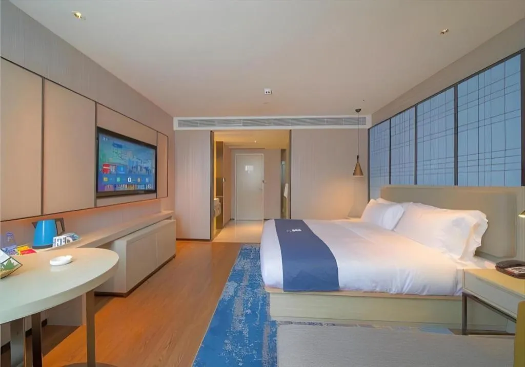 Bed in Echarm Hotel Guangzhou Changlong Shiqiao Metro Station